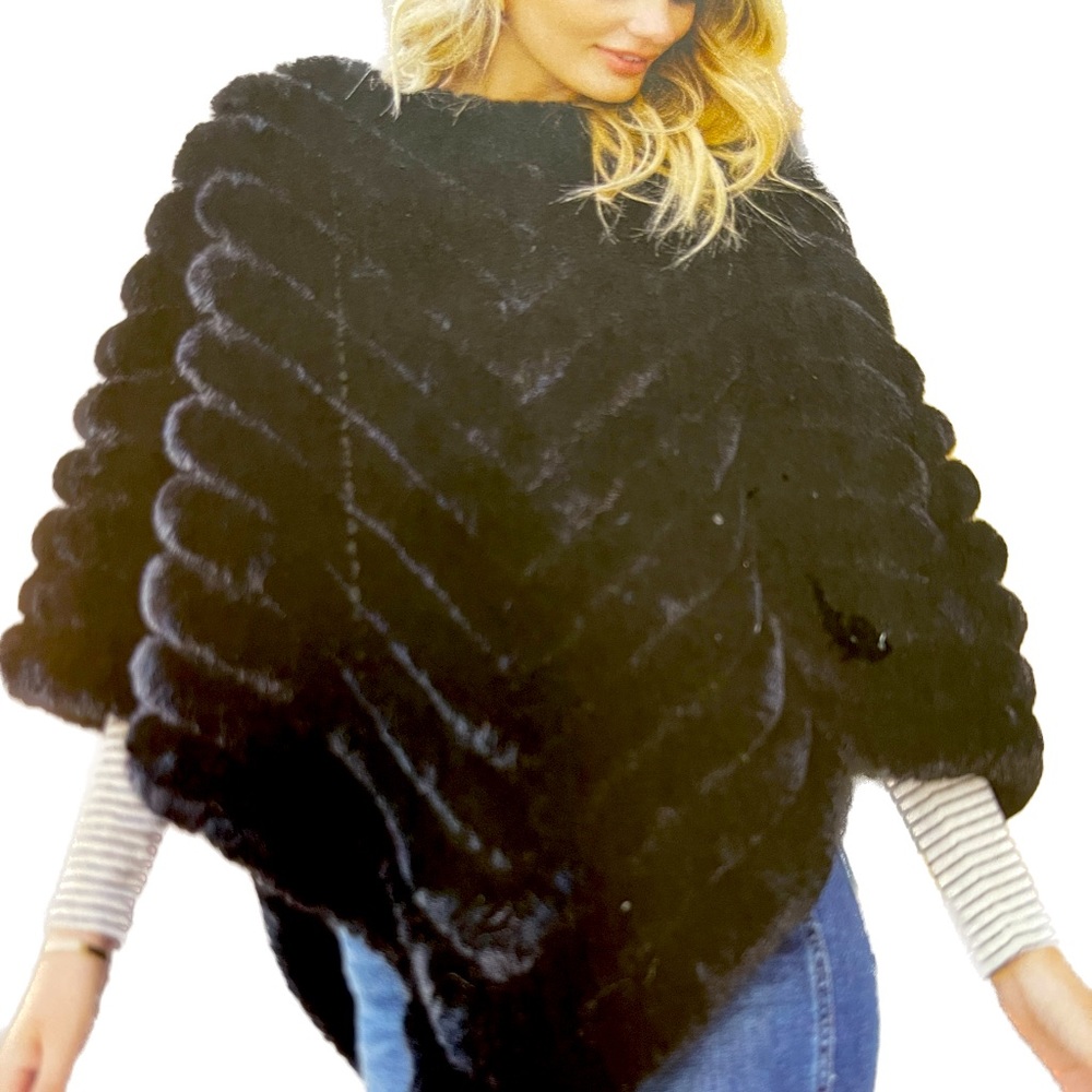 One size fits all never worn fabulous deluxe knitted fur poncho.
